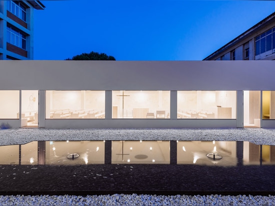 Site Specific Arquitectura converts Portuguese warehouse into monastery chapel