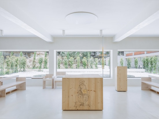 Site Specific Arquitectura converts Portuguese warehouse into monastery chapel