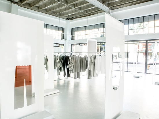 Snarkitecture uses steel sheets with garment-shaped cutaways for COS pop-up shop in LA