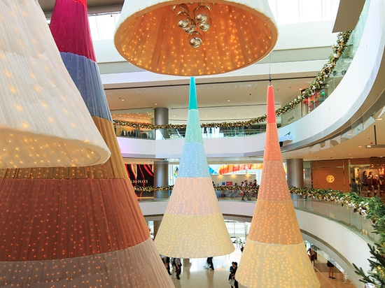 the movement of the trees forces the passers-by to slow down and appreciate the installation