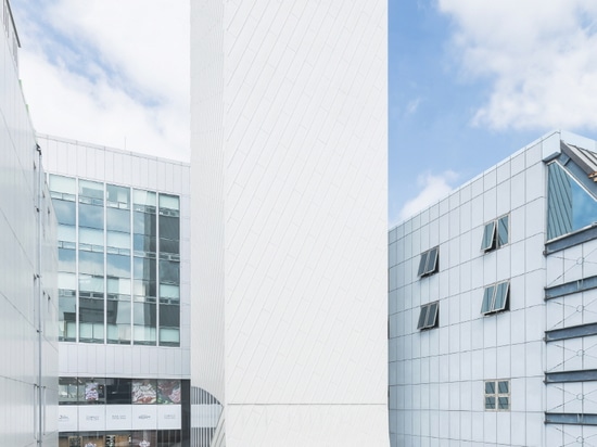 the ship-like structure is clad in white painted aluminum