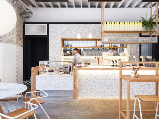 Matt Woods adds teabag chandelier and balancing bowls to Australian cafe