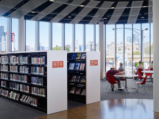 SOM creates a circular library wrapped in aluminium fins for Chicago’s Chinatown