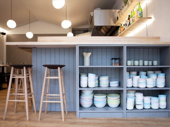 Giles Reid uses pastel tones and sycamore wood for Japanese restaurant in east London