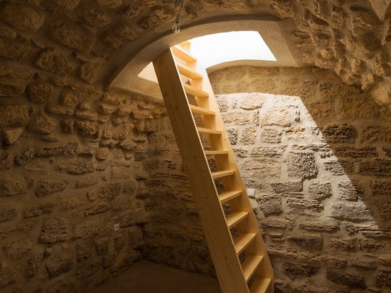 Studio apartment in Paris by Anne Rolland Architecte has a hidden converted slurry