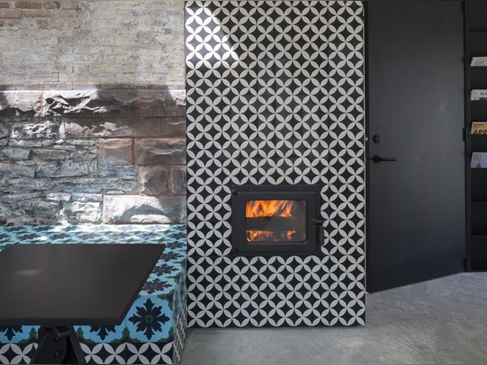 the tower also forms a spatial pocket that contains the bathroom