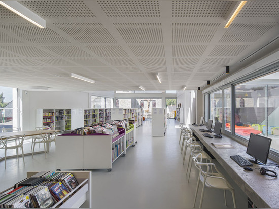 French village library by Studio 02 Architectes presents a gridded facade of wood and glass