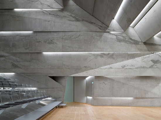 A Tilted, Submerged Concert Hall by Peter Haimerl Architektur