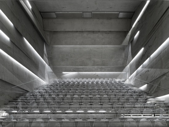 A Tilted, Submerged Concert Hall by Peter Haimerl Architektur