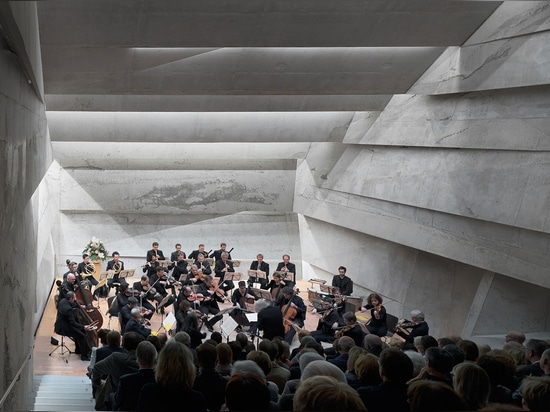 A Tilted, Submerged Concert Hall by Peter Haimerl Architektur