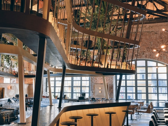 autoban sets kilimanjaro restaurant within warehouse in istanbul