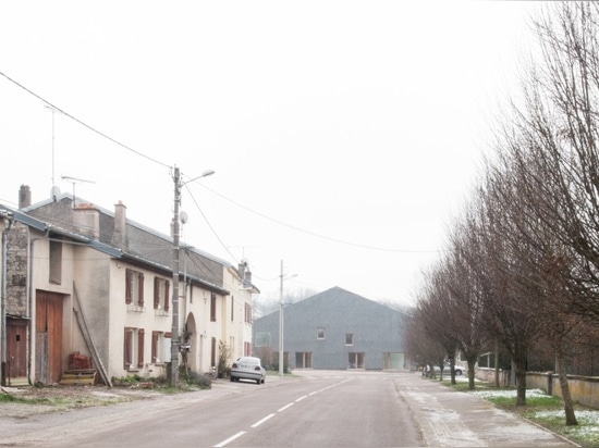 Old French barn is converted into modern apartments for the elderly