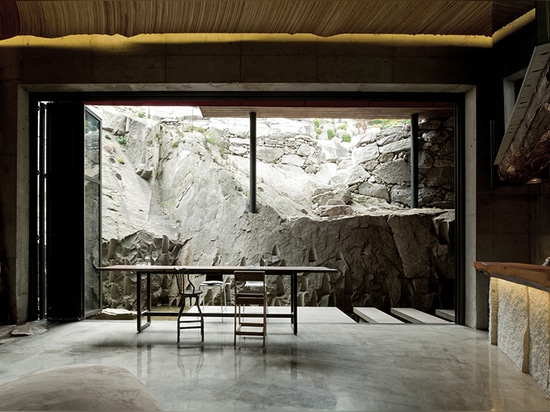 a terrace looks out into the jagged mountains that ‘dayang sanghoi’ stands atop