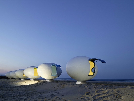 Mobile egg-shaped beach huts installed along a South Korean shoreline