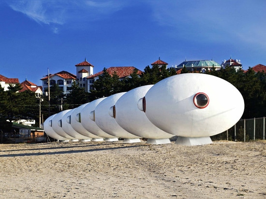 Mobile egg-shaped beach huts installed along a South Korean shoreline