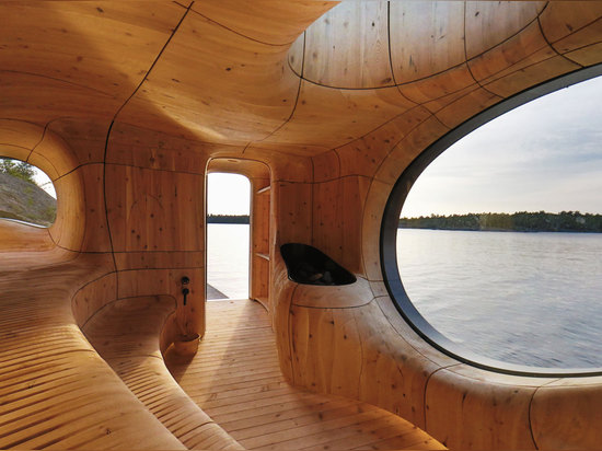 Unlike the sleek, angular wood exterior, the interior is a jigsaw of complex, amorphous shapes