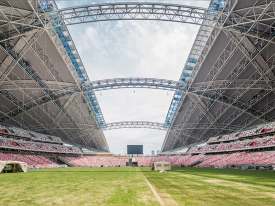 Built on the site of the former Singapore National Stadium, the S$1.3bn complex includes the new 55,000-seat National Stadium, complete with a retractable scarab-like roof. Image courtesy of DP Arc...