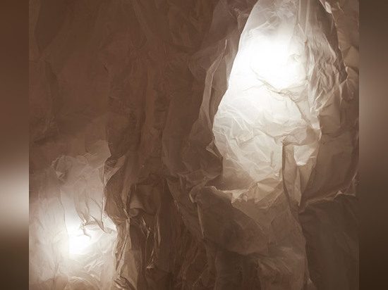 Naoya Matsumoto Design uses crumpled paper to create grotto-like bar in Osaka