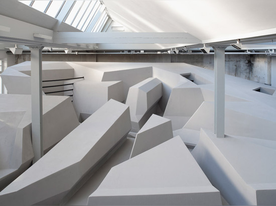 Conceptual office swaps chairs and desks for "experimental work landscape"