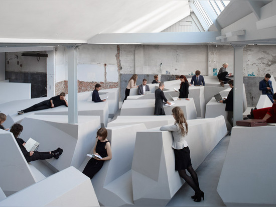 Conceptual office swaps chairs and desks for "experimental work landscape"