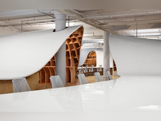 Clive Wilkinson's office for The Barbarian Group is "one huge table through a room"