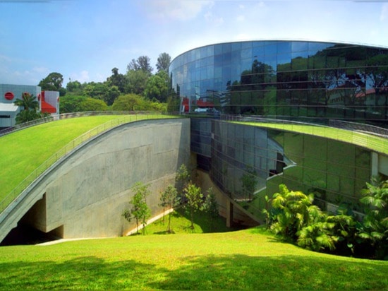 A swirling green roof tops the gorgeous Nanyang Technical University in Singapore