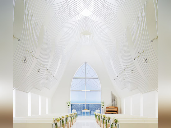 Slate-clad chapel by Eriko Kasahara boasts a veil-inspired ceiling structure