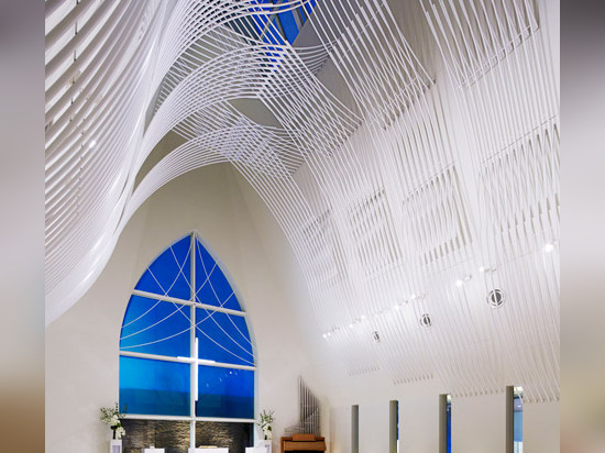 Slate-clad chapel by Eriko Kasahara boasts a veil-inspired ceiling structure