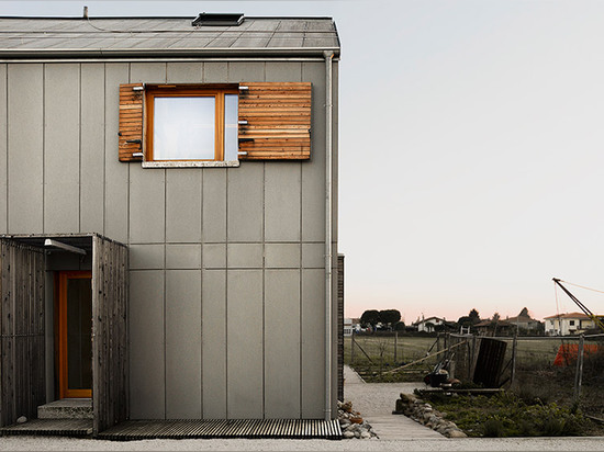 Paolo Carlesso clads Italian family house with cement panels