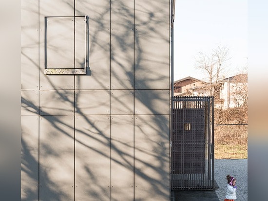 Paolo Carlesso clads Italian family house with cement panels