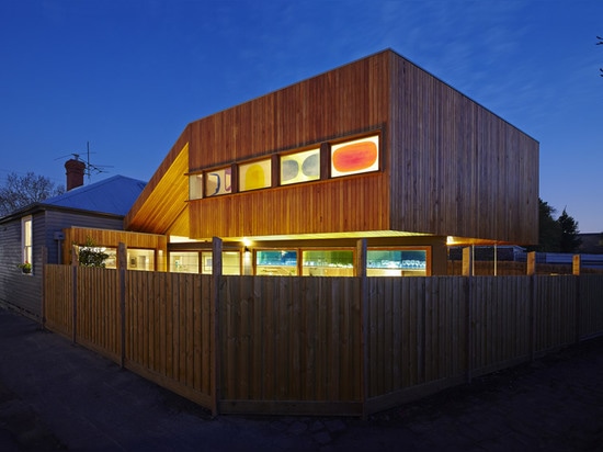 Triangular void connects a two-storey timber extension to a Melbourne bungalow