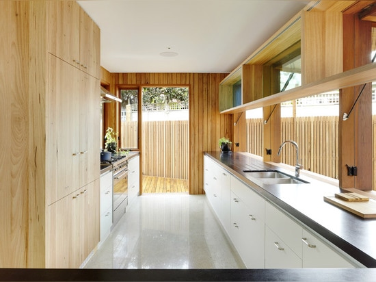 Triangular void connects a two-storey timber extension to a Melbourne bungalow