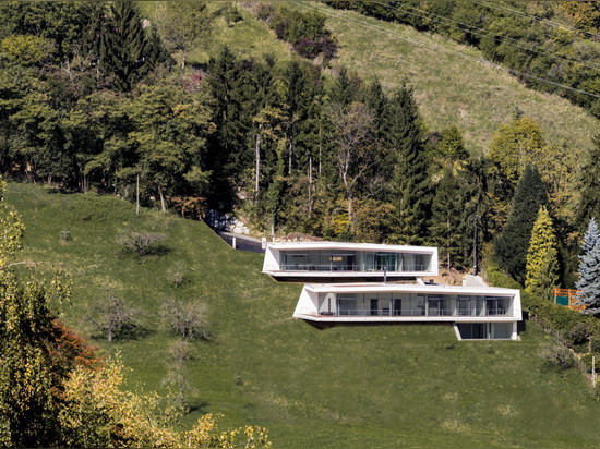 Love Architecture completes house of two halves overlooking an Austrian valley