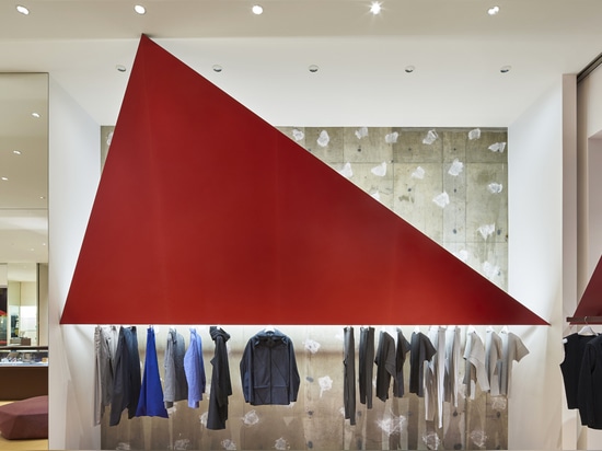 Tokujin Yoshioka installs giant red triangles for Tokyo Issey Miyake store