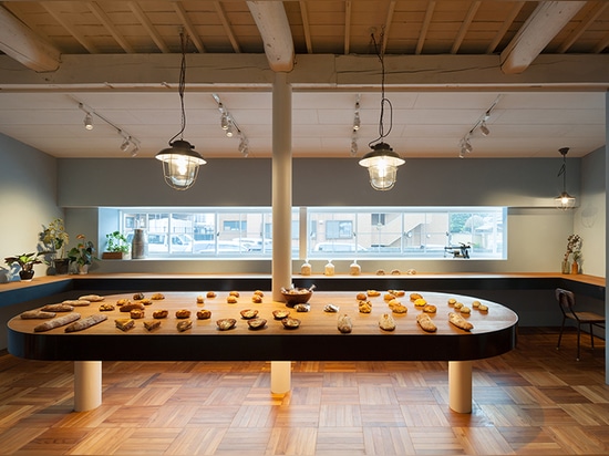 Old timber-framed house transformed into a bakery by Movedesign