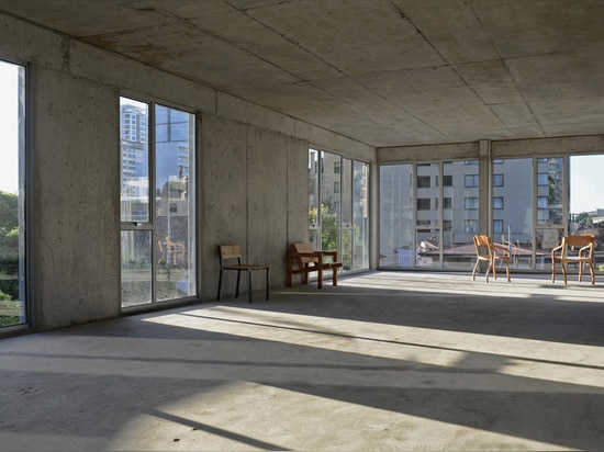 floor-to-ceiling windows provide ample daylight