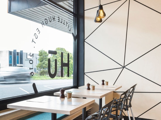 The interior of this cafe is covered in geometric panel shapes