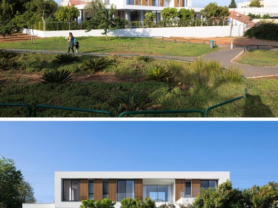 Large sliding glass walls give this house easy access to the pool