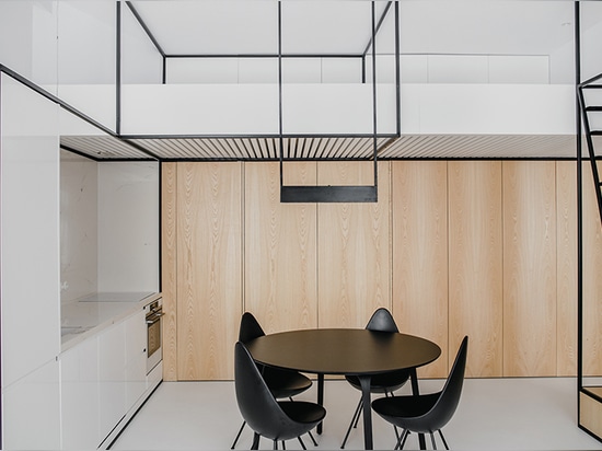 MUS architects' wireframe apartment in cracow is designed to adjust the clients' lifestyle