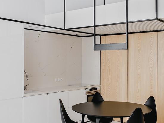 MUS architects' wireframe apartment in cracow is designed to adjust the clients' lifestyle