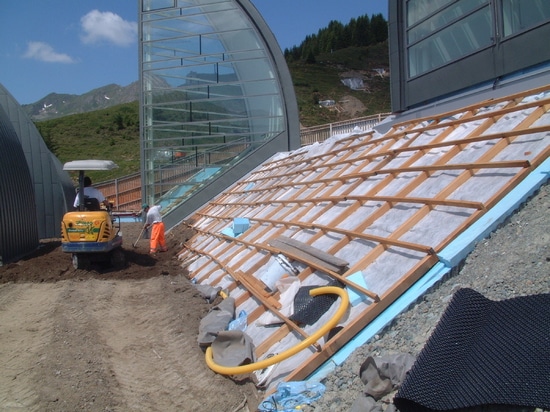 Fitting the wooden construction that resembles an  “avalanche support“.