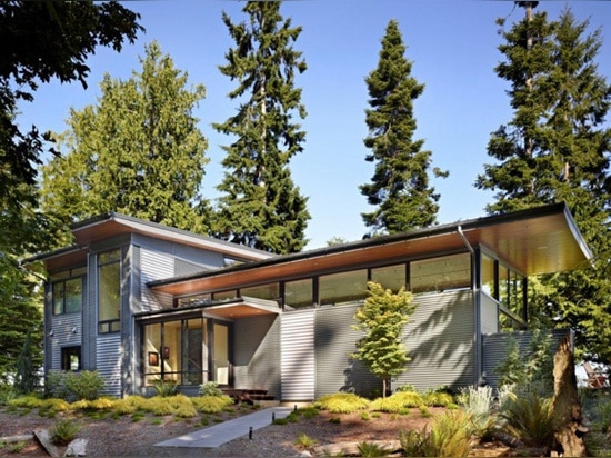 This Pacific Northwest House Is Located On A Wooded Waterfront Property