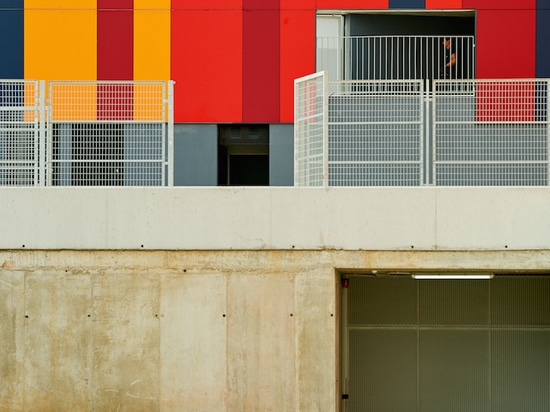 foraster's colorful rehabilitation swaps the standard cement aspects of a school in bilbao