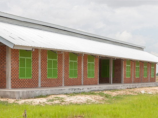 weston williamson + partner and building trust international design brick-clad school in cambodia