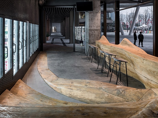 daipu architects fuses 'wood mountain' terrain with concrete for a pub in chongqing