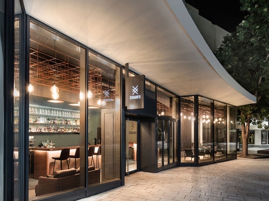 This Bar In Stuttgart Has Walls Of Glass That Show Off The Wood And Copper Interior