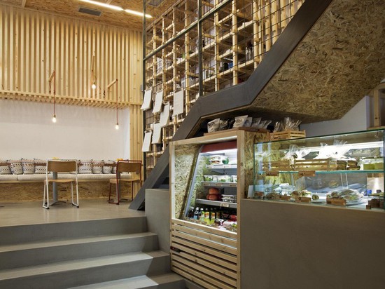 A Cafe Designed To Look Like The Inside Of A Packaging Crate