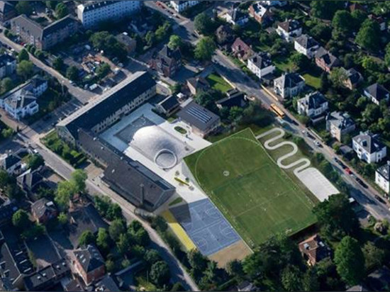 Bjarke Ingels goes back to school, revamps his old alma mater with a new gymnasium