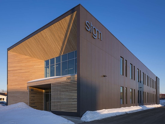 Daylit STGM Head Office uses reclaimed wood, solar power and a green wall to create a truly sustainable work environment