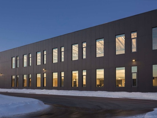 Daylit STGM Head Office uses reclaimed wood, solar power and a green wall to create a truly sustainable work environment